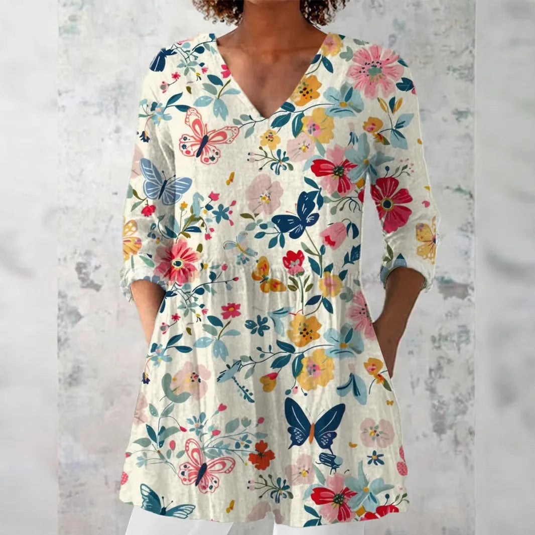 Women's slim fit retro print long sleeve top in polyester, shown in one of twelve available colour styles.