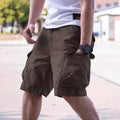 Men's loose-fit cotton blend workwear shorts in army green, shown flat.