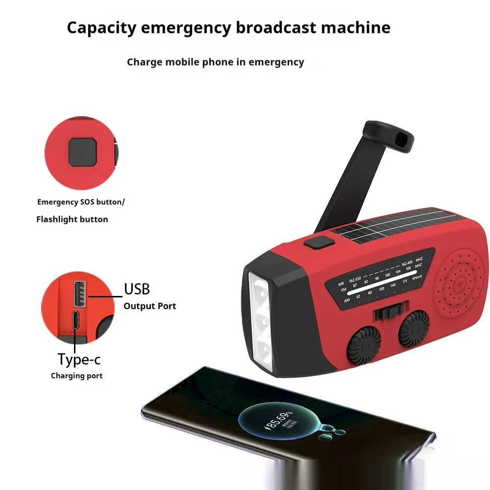 Red emergency rechargeable hand radio torch with wrist strap showing USB port and control buttons
