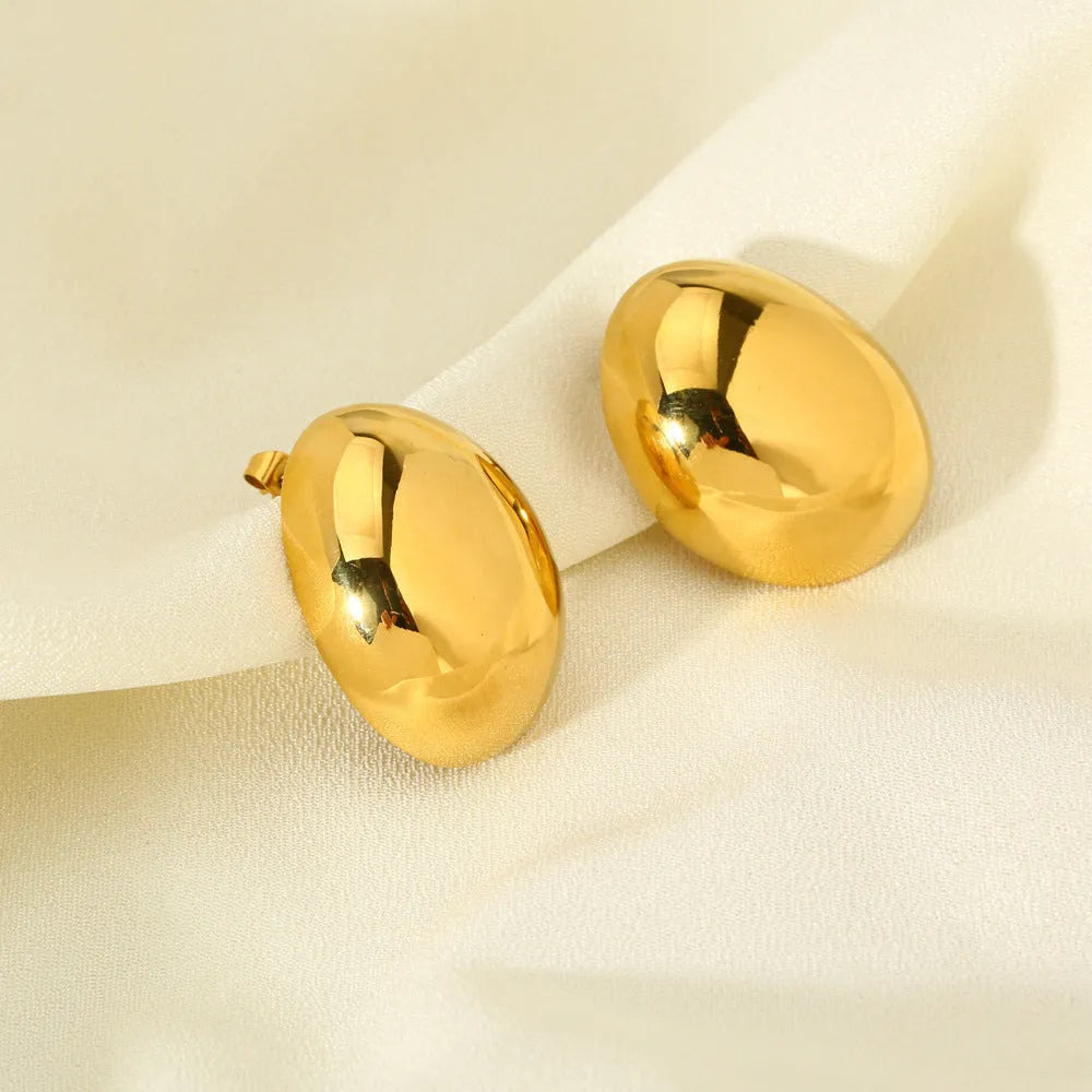 Geometric ear studs with exaggerated glazed surface in 18K gold electroplated stainless steel