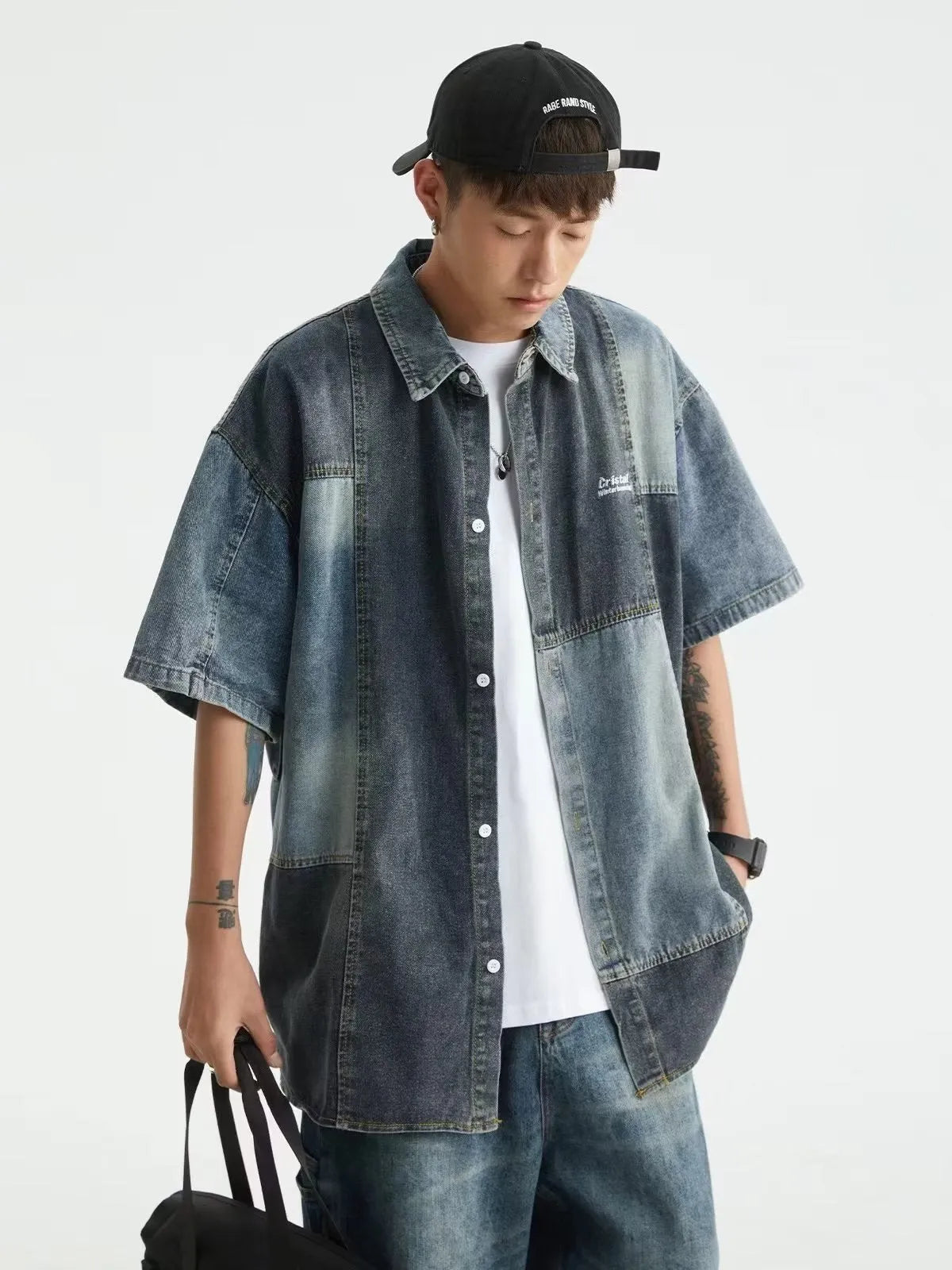Blue Japanese-style loose fit denim shirt for men with washed stitching details.