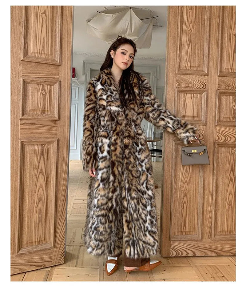 Women's faux fur coat with fox fur collar in street fashion style showing pockets and regular sleeves