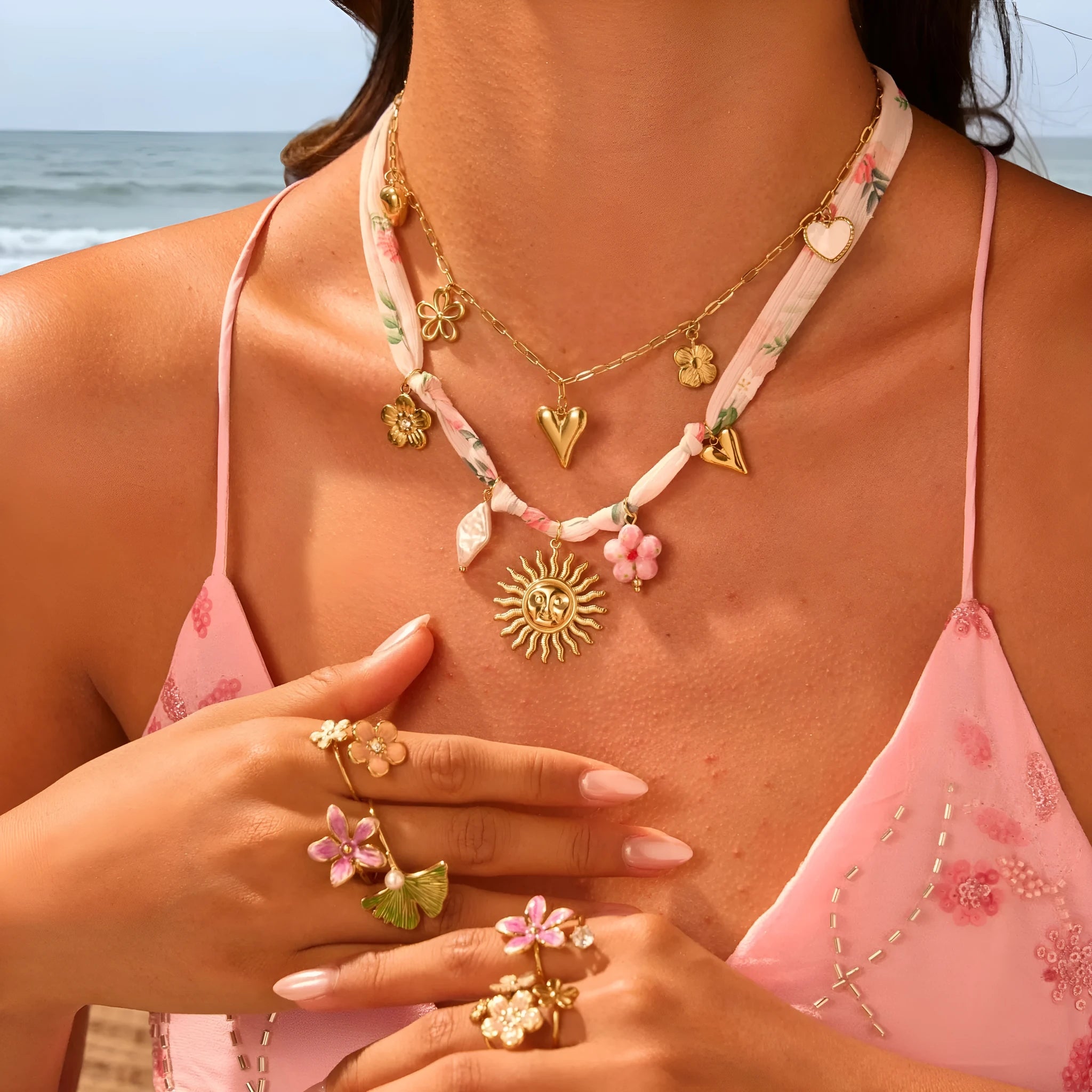 Stainless steel necklace with geometric sun pendant on adjustable 41-50cm chain, 18K gold plated finish