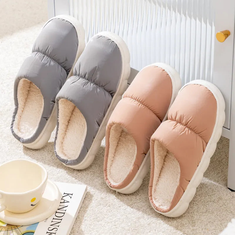 Pair of down cotton winter slippers with a thick rubber non-slip sole, shown in a choice of colours.