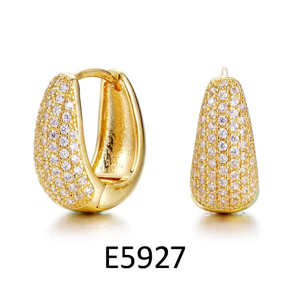 Brass gold plated heart shape zircon ear clip earrings with gang drill detailing on copper base