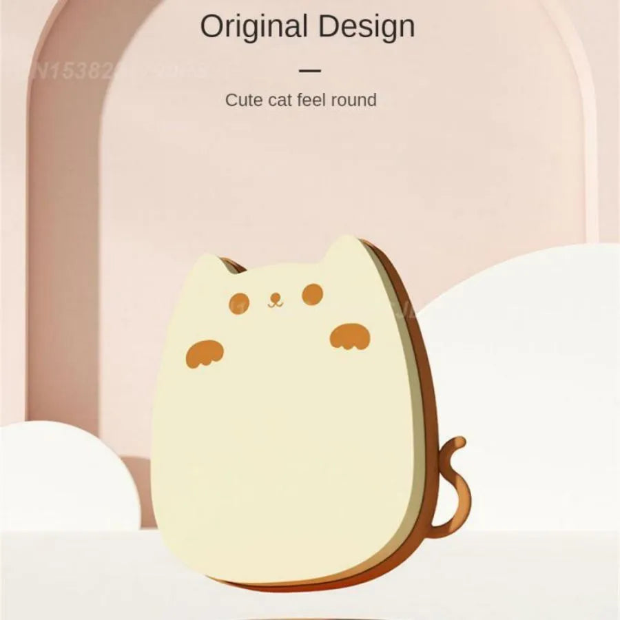 Brown silicone pet grooming comb with dual bristle design for cats and dogs on white background