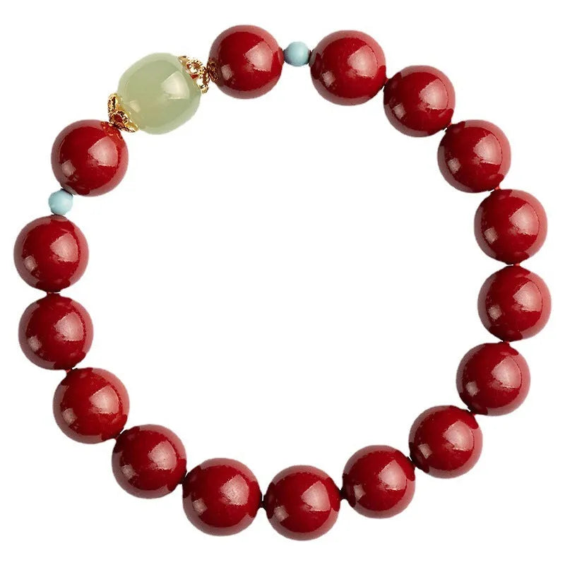 Purple Gold Sand cinnabar Hetian jade bead bracelet in geometric elliptical shape on wrist.