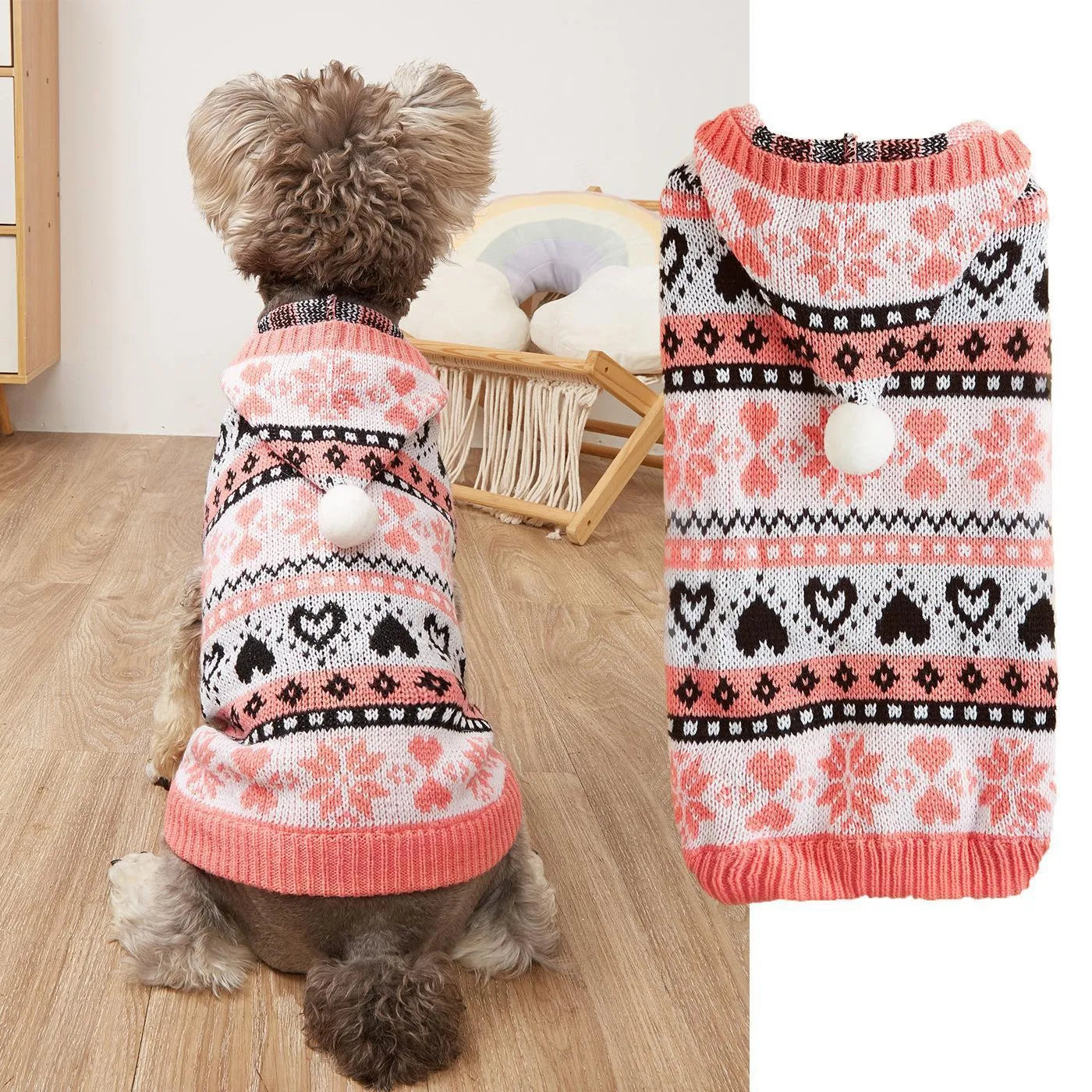 Pink knitted dog sweater with snowflake and striped camouflage patterns on a small Bichon dog