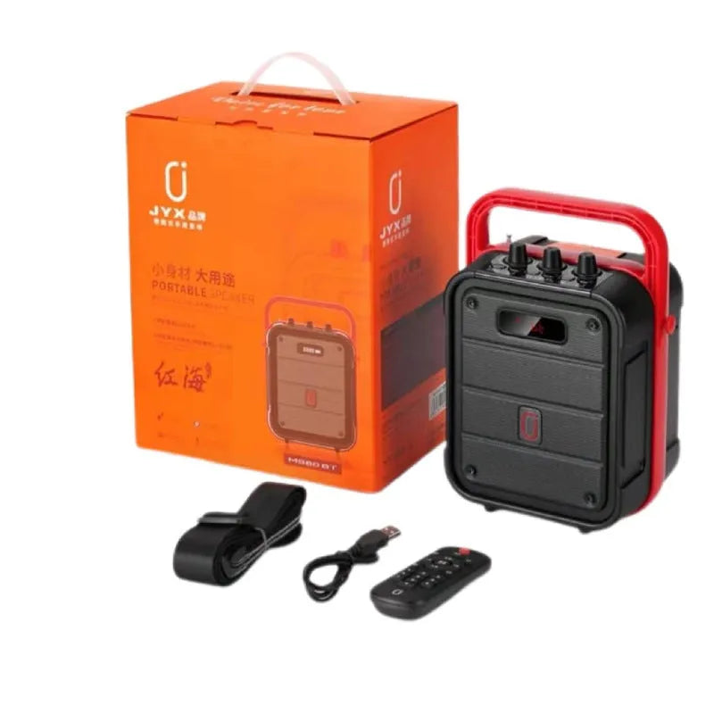 MS62AI colour portable Bluetooth speaker with wireless microphone and remote control on table
