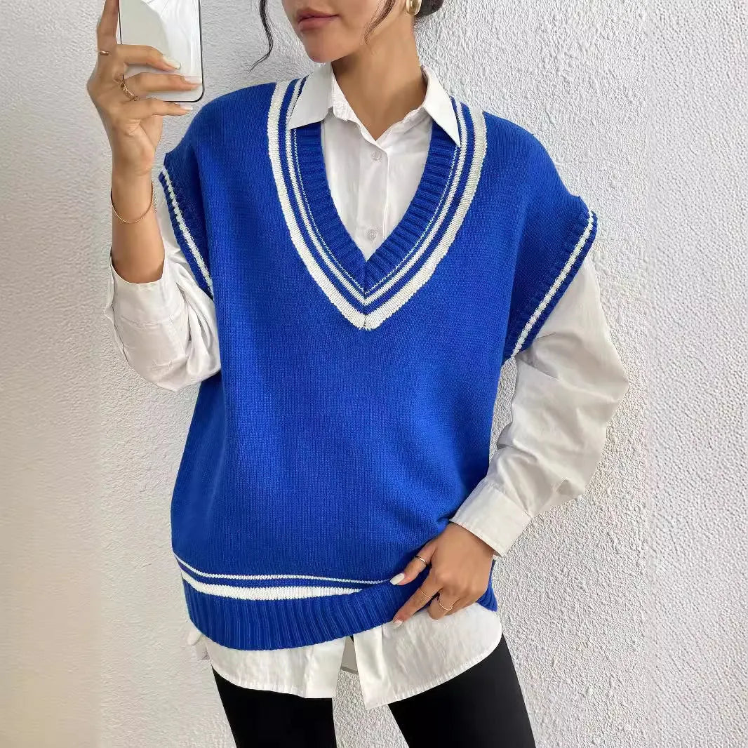Loose-fitting women's vest sweater in a wool blend, shown in coffee, blue, and black colours.