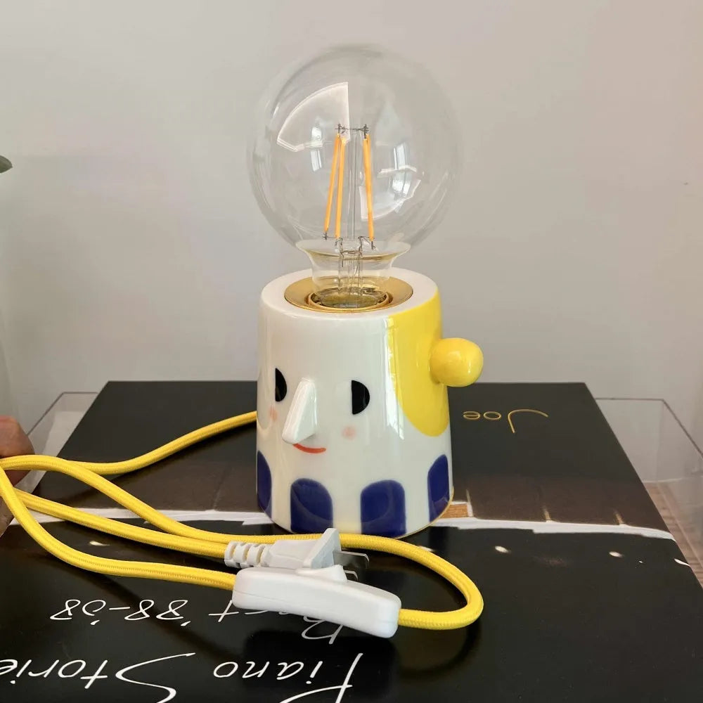 Handmade ceramic spherical ball headlight lamp on bedside table