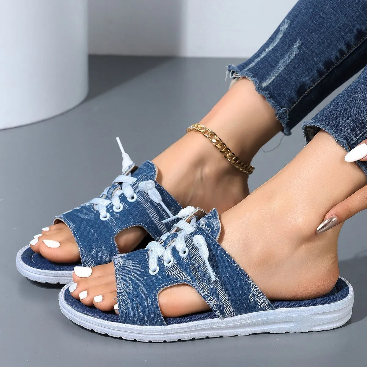Blue Roman style women's flat canvas slippers with cloth lining and rubber sole