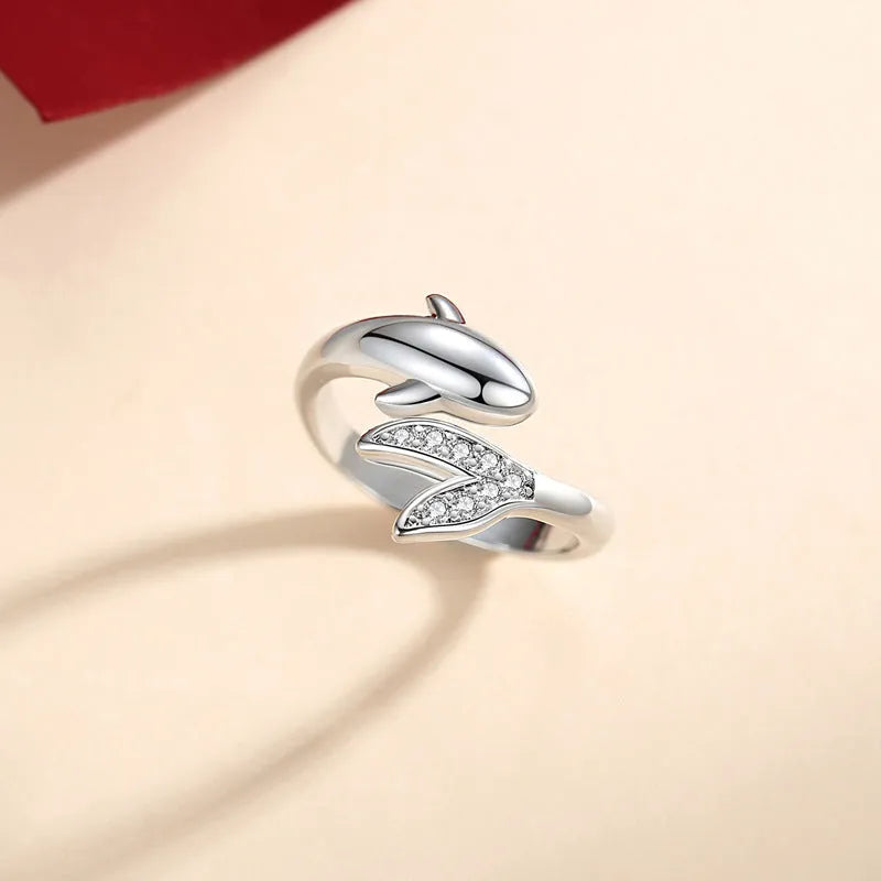 Simple diamond inlaid small fish couple ring with adjustable opening in copper electroplated finish, dolphin style