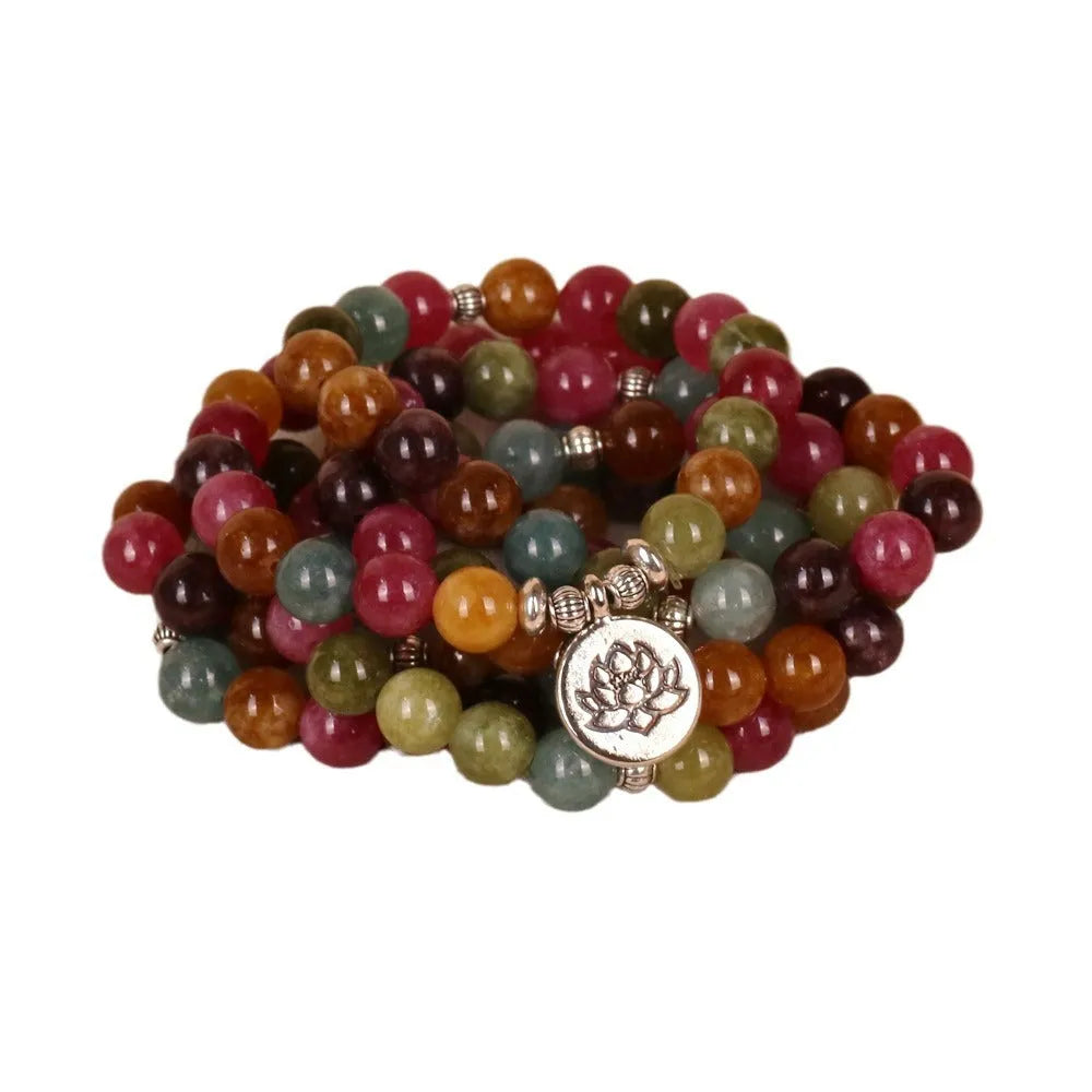 Multi-strand bracelet with 108 natural tourmaline beads and lotus charm on alloy chain