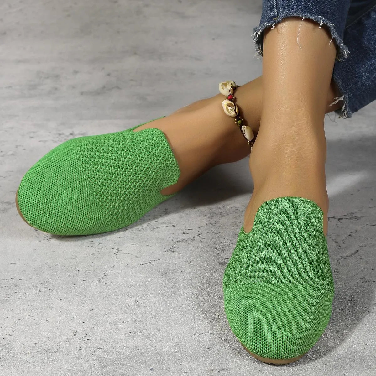 Apricot, blue, and green mesh slip-on sandals with round toes and flat rubber soles
