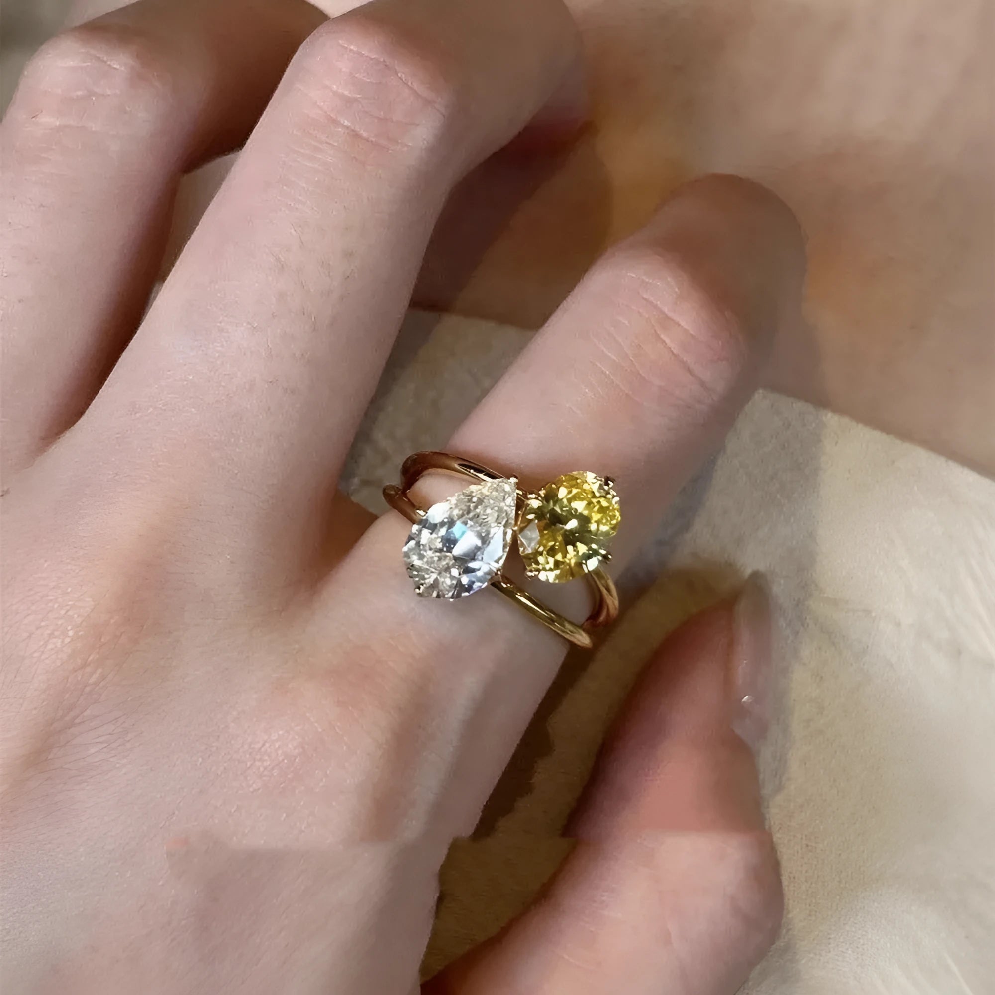 Copper geometric open ring with water drop design and double sheng stone colour contrast.
