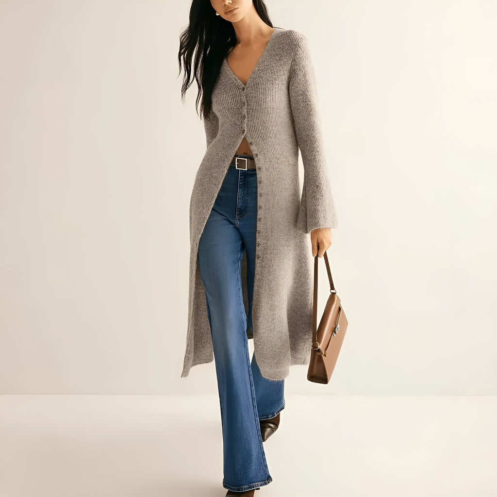 Retro French style long sleeve cardigan coat in khaki with button front on a woman, soft acrylic and viscose blend
