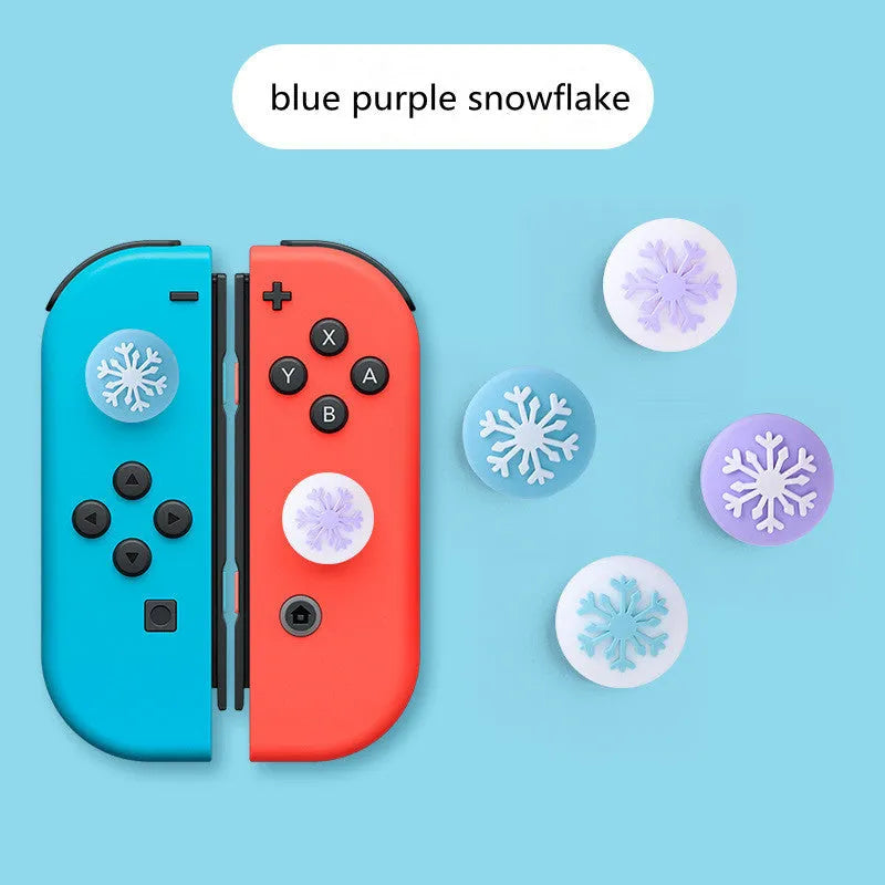 Set of four silicone cat claw keycaps for Nintendo Switch Lite joycons in assorted colours.
