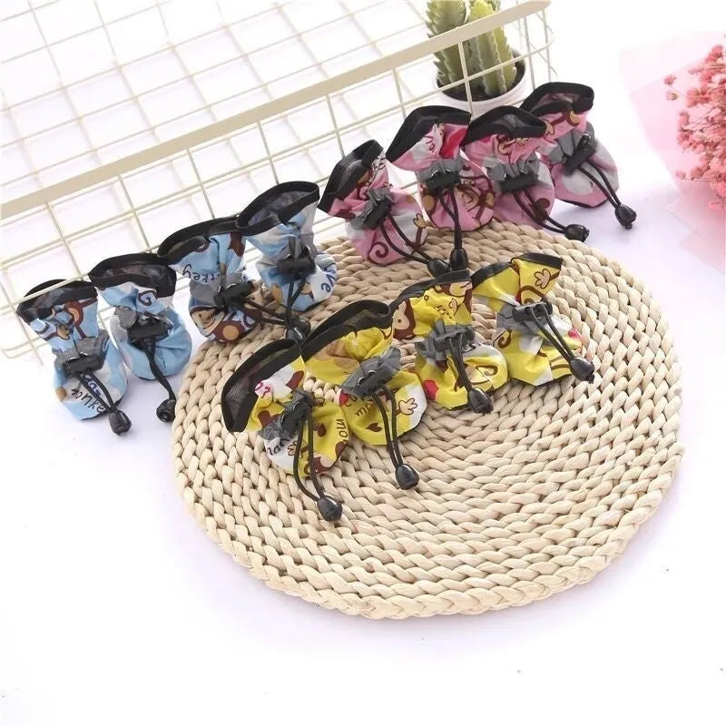 Set of four breathable cloth dog shoes with soft sole in multiple colours for small and medium breeds