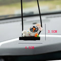 Resin astronaut car pendant with hand-painted cartoon designs in five colour variations