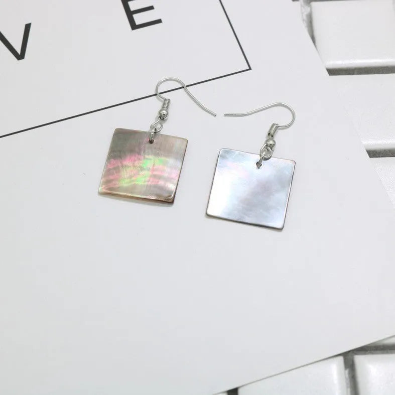 Women's geometric drop earrings made from real shell in square panther colour.