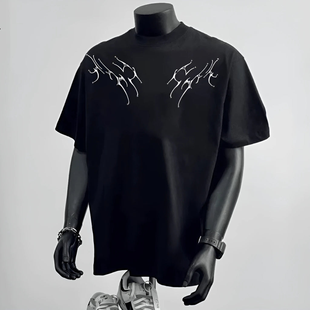 Men's black loose fit short sleeve cotton t-shirt with a print, laid flat.