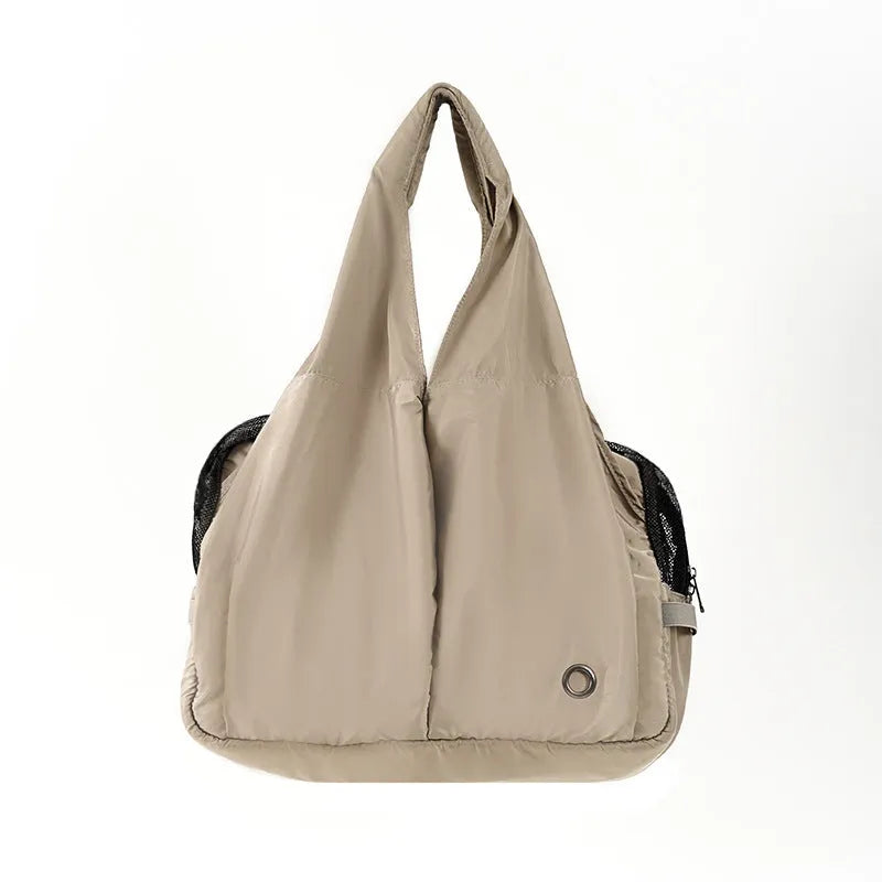 Apricot cloth pet carrier handbag showing dimensions of 41cm length by 16cm width by 28cm height