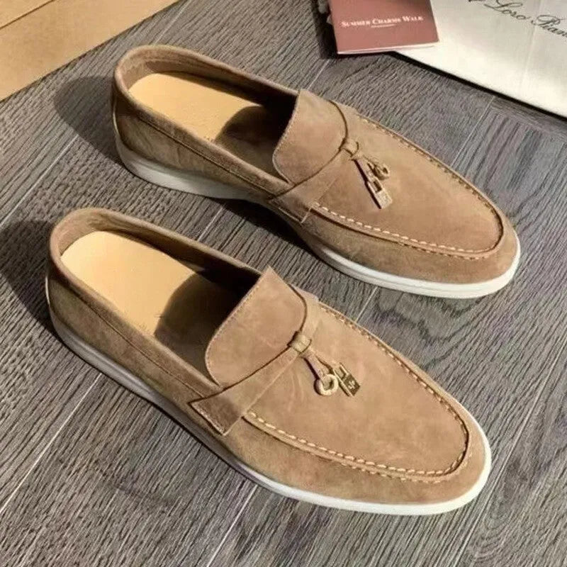 Pair of high-top gommino slip-on loafers in a choice of colours with round toe and rubber sole.