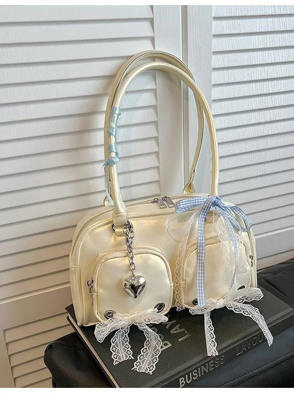 Horizontal square shoulder bag in soft PU material with double straps and internal phone compartment