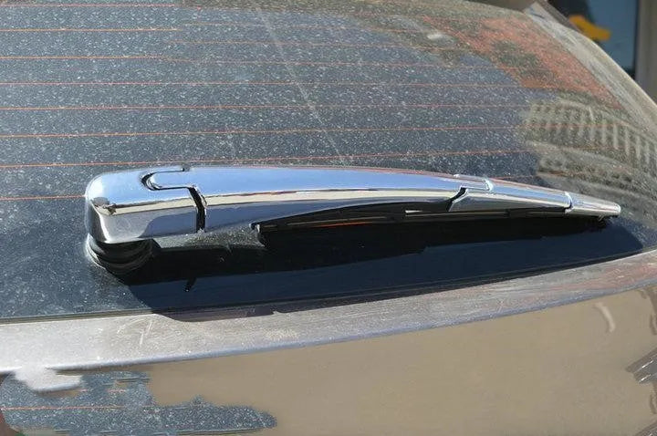Set of four silvery ABS plastic rear window wiper cover strips for a 2010 Hyundai.