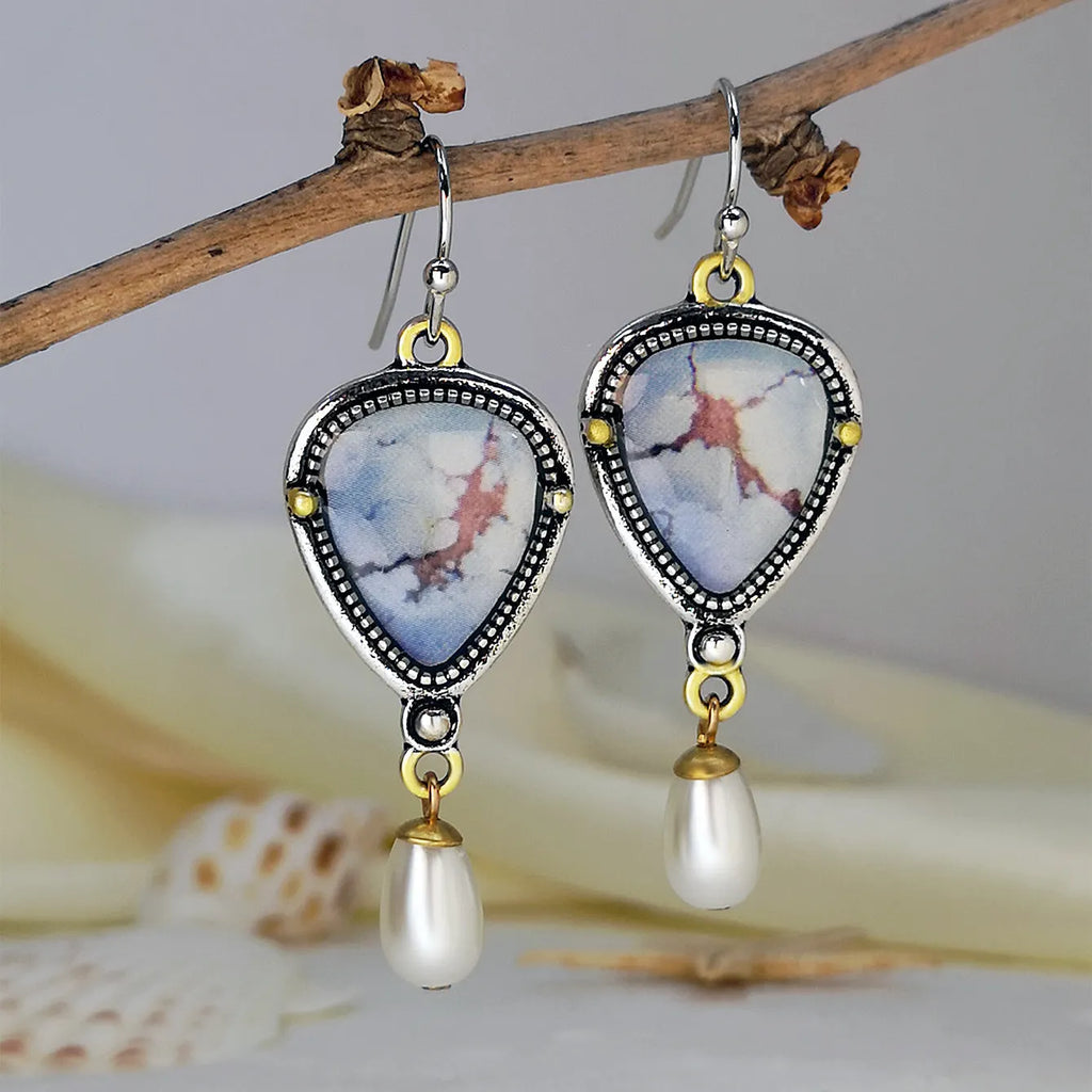 Retro blue drop earrings with synthetic opal and pearl on electroplated metal, 49mm long.