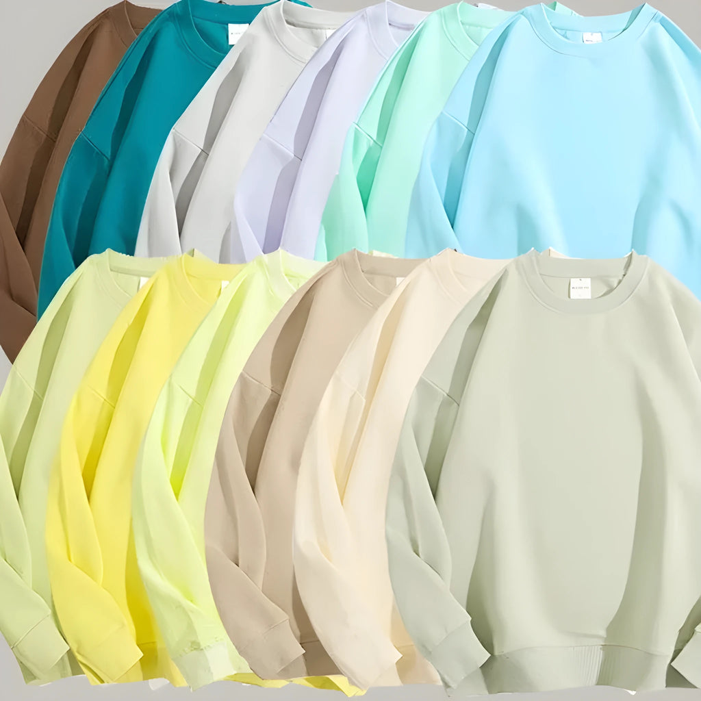 Women's loose round neck off shoulder cotton sweater in a mint green colour, long sleeves.
