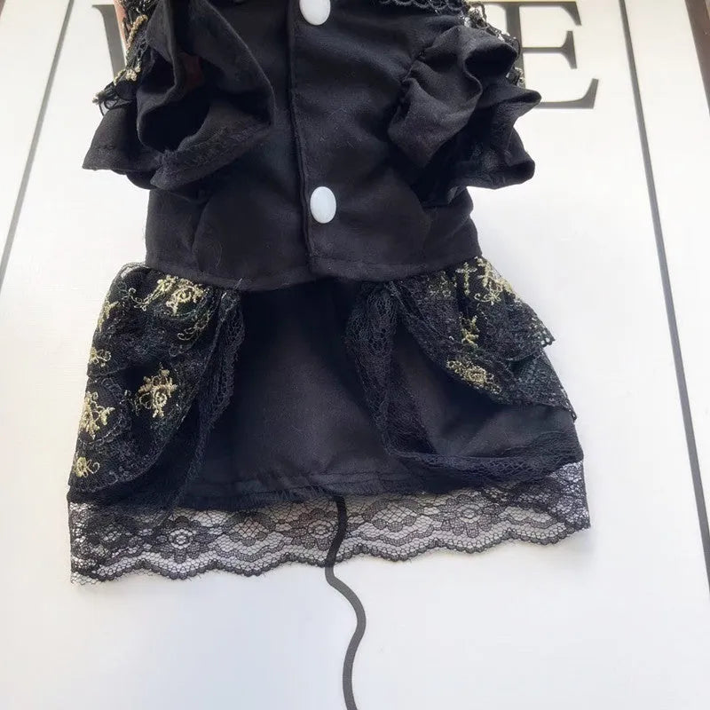Gold Gothic princess style dress for a small dog or cat on a hanger