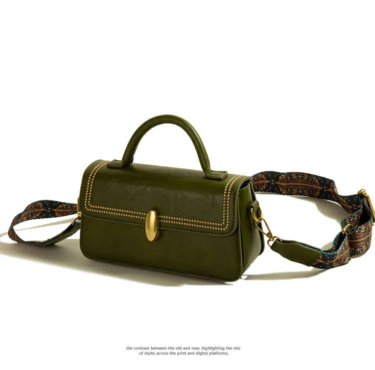 Brown retro messenger bag with sewing thread detailing showing mobile phone compartment and sandwich pockets