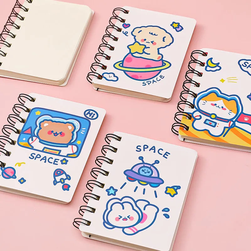 Astronaut themed portable pocket notebook showing soft cover design options and compact 10.5x8cm size