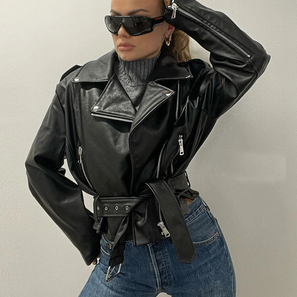 Black leather punk jacket with lapel collar and drawstring waist on a model