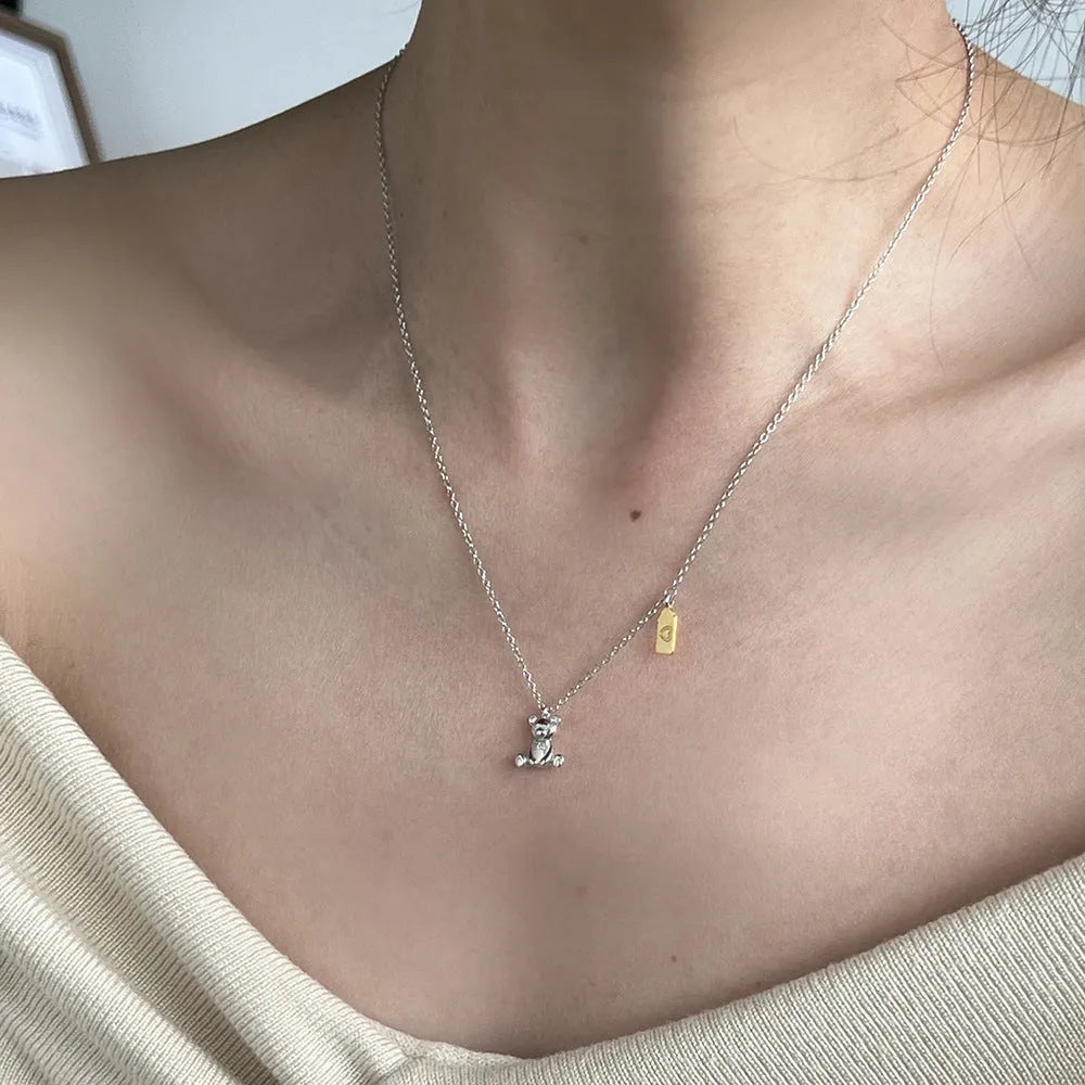 925 silver bear necklace for women with electroplated finish on white background