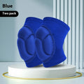 A pair of black thick sponge knee pads for dance and sports protection on a knee.
