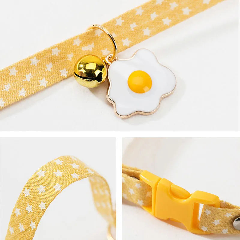 Adjustable cat collar with bell pendant and bow tie accessory in green, pink, or yellow colours