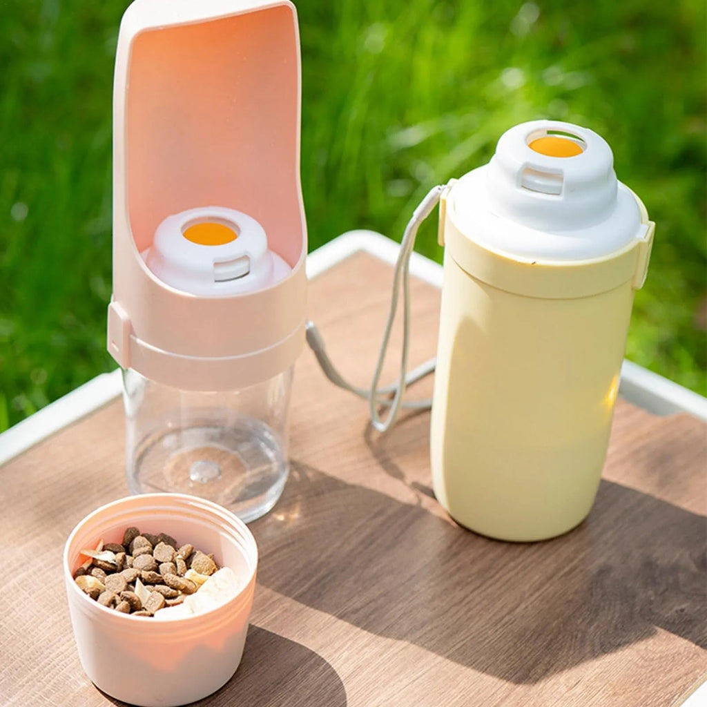 2-in-1 travel dog water bottle with 690ml capacity and green lanyard, folded to 20cm x 9cm, showing transparent body and dual compartments