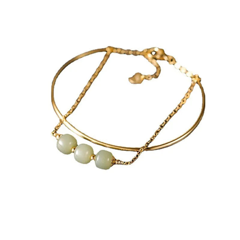 Hetian jade lucky beads bracelet with gold inlay, shown in single, double, and three bead versions.