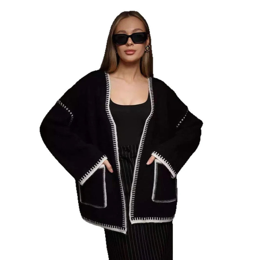 Lace-up front knitted cardigan in a loose fit, shown in black, camel, and white colour options.