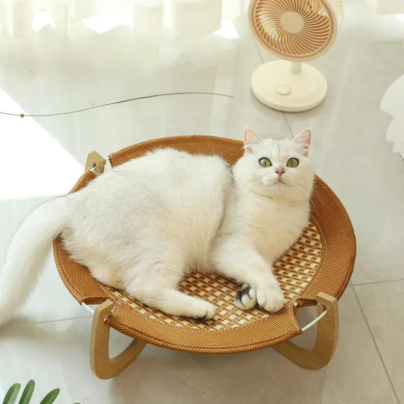 Brown woven rattan pet bed measuring 46 cm square with raised sides for cats and small dogs
