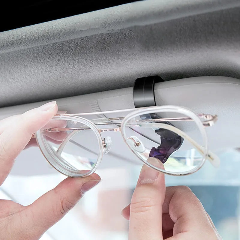 Black plastic car sun visor clip organiser for holding glasses and cards