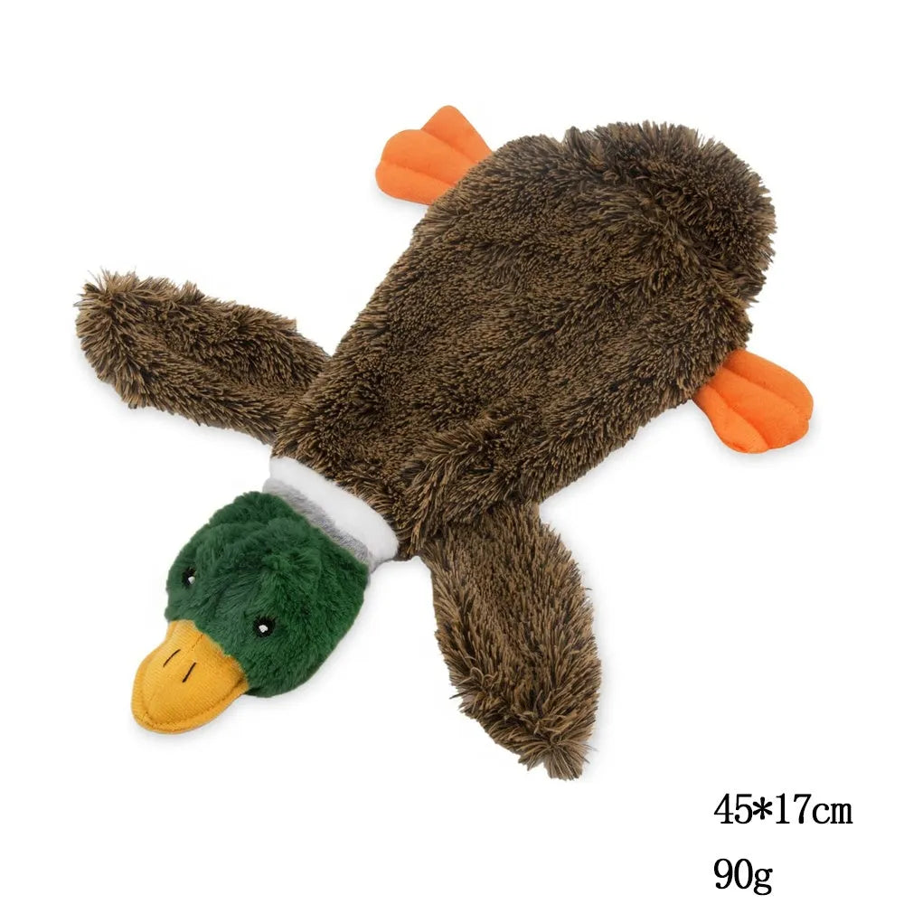 Green duck-shaped stuffless dog toy with squeakers and bottle insert opening