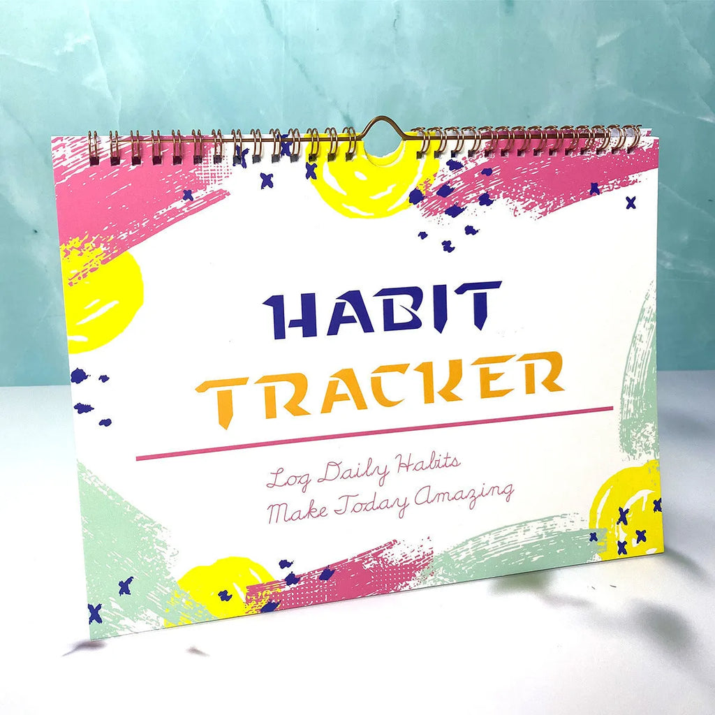 English habit tracking book open showing pages, 21cm by 28cm in flower white colour