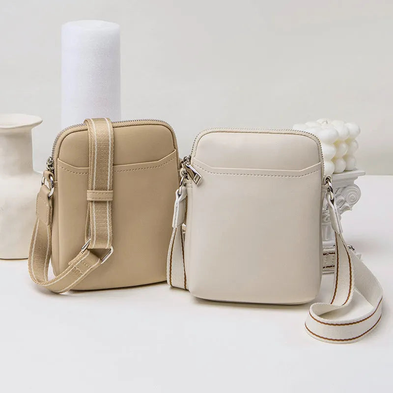 Solid colour PU leather mobile phone shoulder bag showing crossbody and shoulder carry options