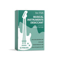 Single pack musical instrument desiccant with calcium chloride and wood pulp for moisture absorption