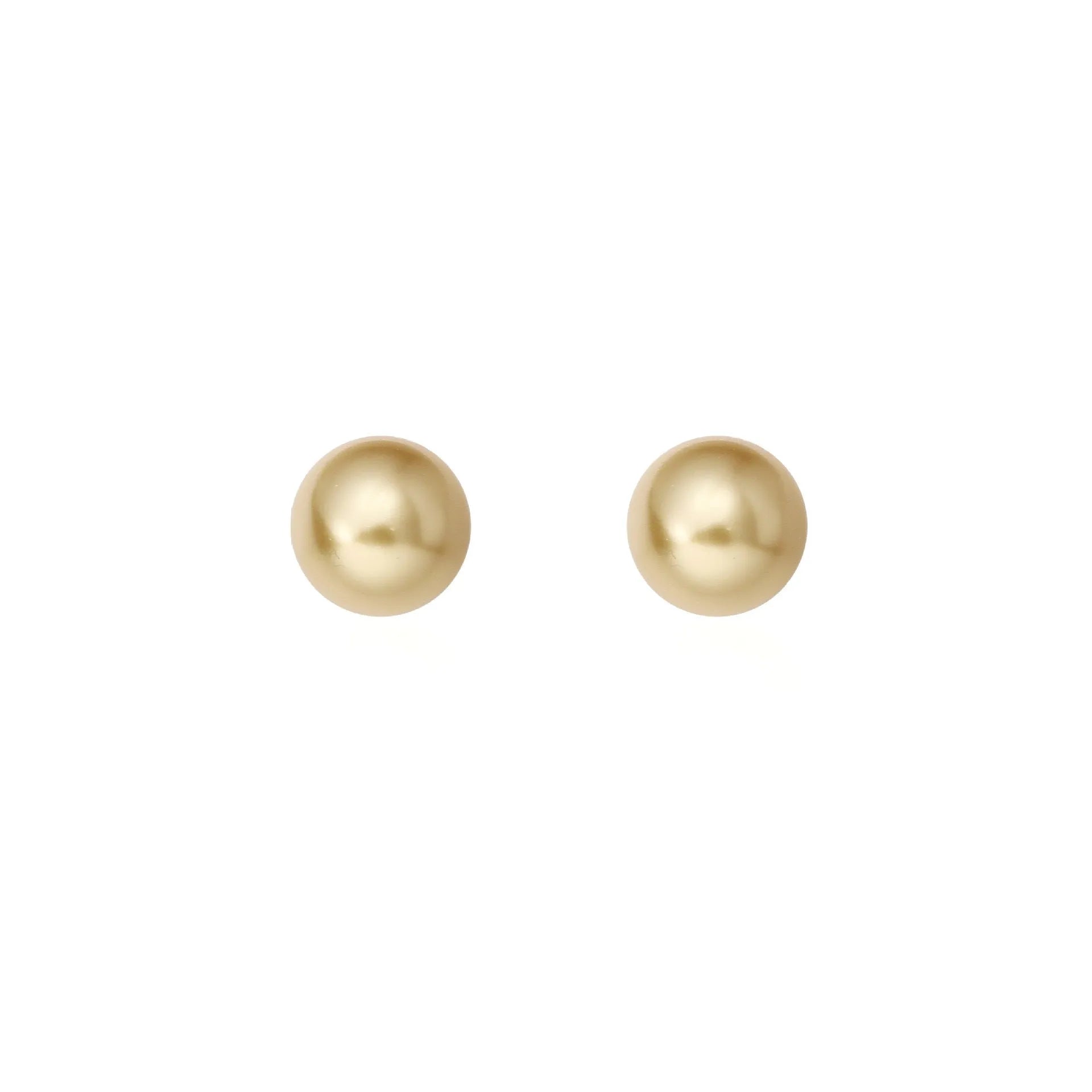 A pair of large geometric pearl stud earrings with an eight-point star accent on a silver setting.