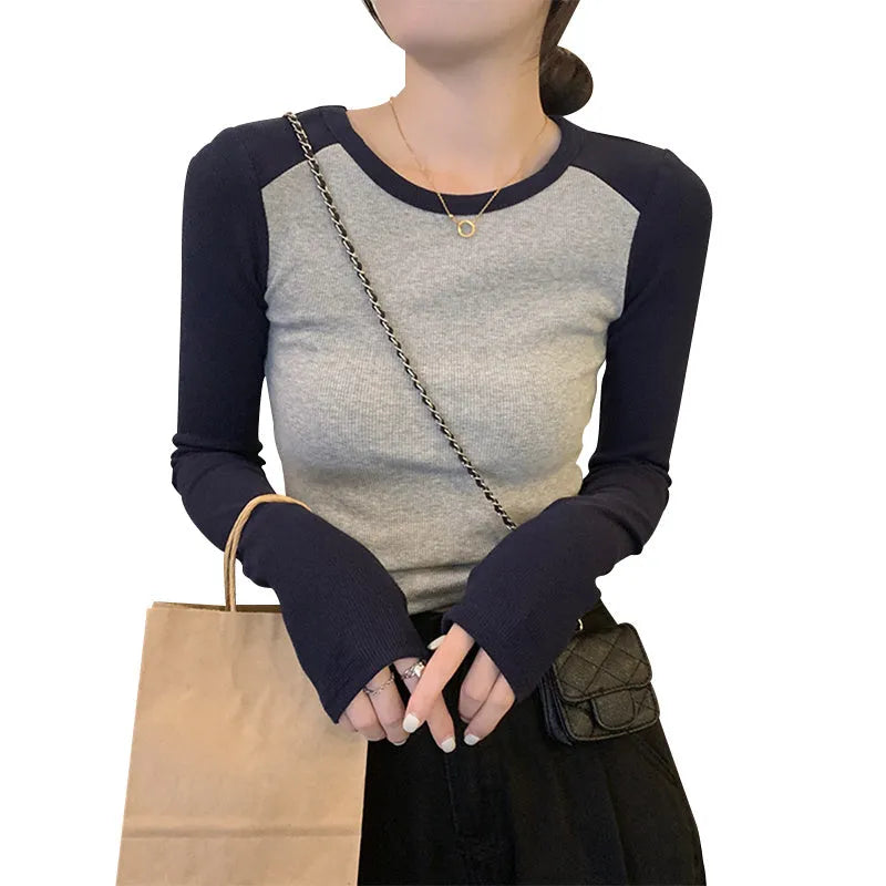 Women's dark blue viscose slim-fit top with princess sleeves and embroidery, shown in an oversized short-length design.